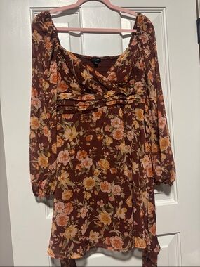 Blu Pepper Floral v-neck Long bubble sleeve dress. Elastic back and tie bow.